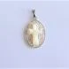 Cross pendant in oval shape