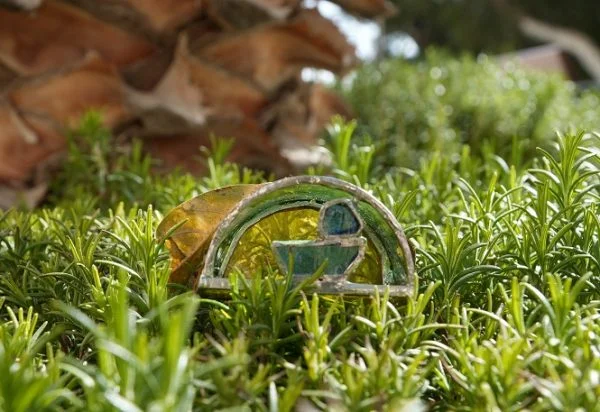 Baby Jesus  in a Recycled Glass Manger